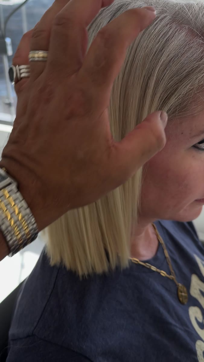 A fresh precision lob in platinum blonde, finished